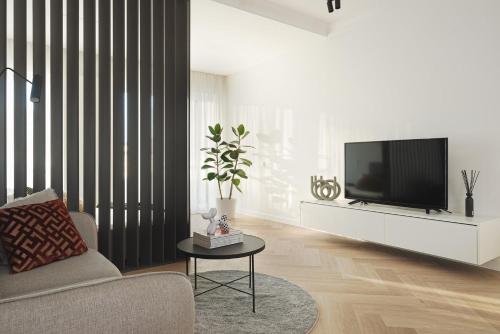 TV a/nebo společenská místnost v ubytování Apartament MODERNO