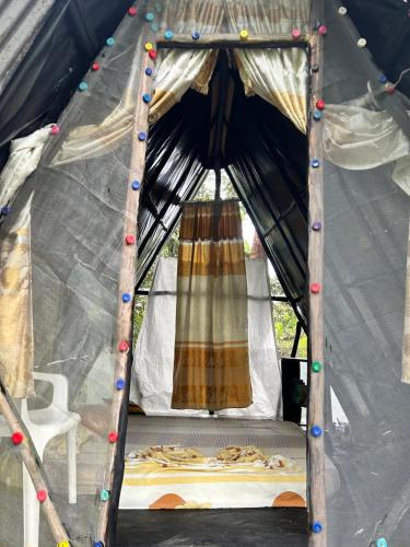 Postel nebo postele na pokoji v ubytování Posada El Silbo Apacible Cabaña y Camping