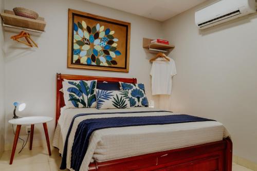 Ein Bett oder Betten in einem Zimmer der Unterkunft Pousada Familiar Recanto das Orquídeas