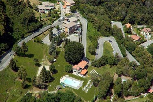 an aerial view of a mansion with a house and a road at PROVINCIALE 79 in Magreglio
