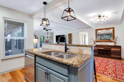 a kitchen with a sink and a counter at Richters Garage - A Birdy Vacation Rental in Boerne