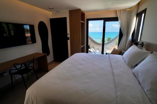 Cama o camas de una habitación en PIPA INN Pousada