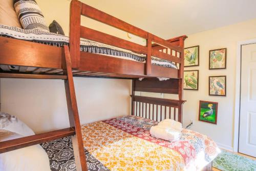 a bunk bed room with two bunk beds at Heron Hideaway in Folly Beach