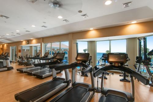 a gym with treadmills and elliptical machines at Portofino Island P2-905 in Pensacola Beach
