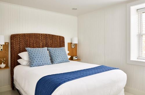 Katil atau katil-katil dalam bilik di Blue - Inn on the Beach