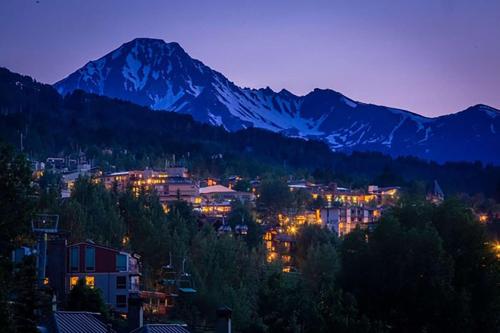 a view of a city with a mountain in the background at Seasons Four 172 Two bedroom plus loft in Snowmass Village