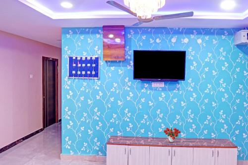 Μια τηλεόραση ή/και κέντρο ψυχαγωγίας στο Super Hotel O SAI LEELA RESIDENCY