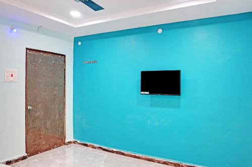 Μια τηλεόραση ή/και κέντρο ψυχαγωγίας στο Super Hotel O SAI LEELA RESIDENCY