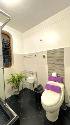 Ένα μπάνιο στο Allincay Cusco Apart Hotel