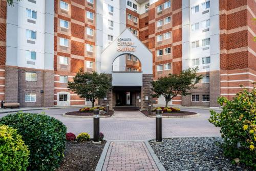 a rendering of the front of a building at Sonesta Simply Suites Jersey City in Jersey City