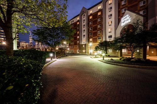 an empty street in a city at night at Sonesta Simply Suites Jersey City in Jersey City