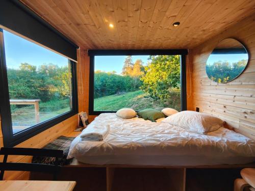 Posteľ alebo postele v izbe v ubytovaní Tiny House MOOSE HOME Les Chaumes