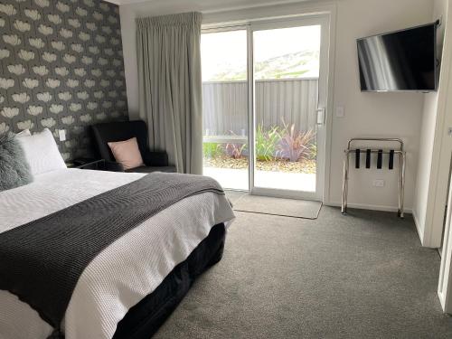 Una cama o camas en una habitación de Lakeview Terrace Accommodation