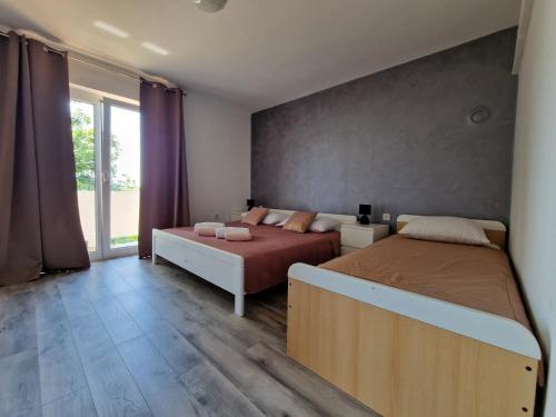 Apartments with parking space Barbat, Rab - 22167