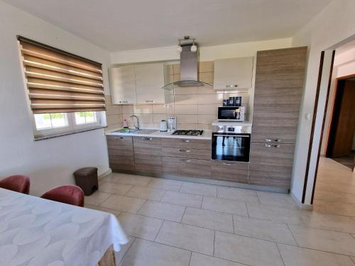 Apartments with parking space Barbat, Rab - 22167