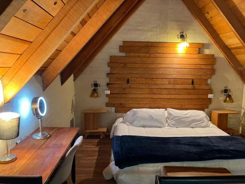 Postel nebo postele na pokoji v ubytování CABAÑAS SAN MATEO en mazamitla