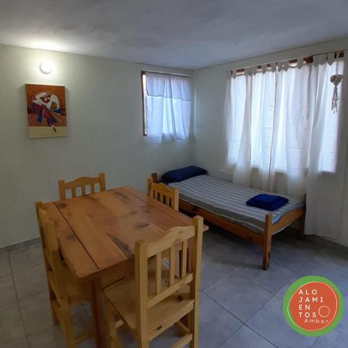 En eller flere senge i et værelse på Ambar