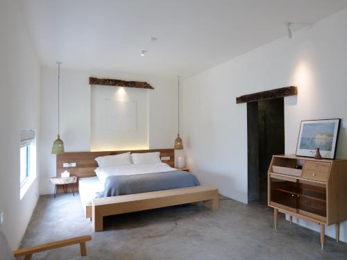 Φωτογραφία από το άλμπουμ του Ting Jian Empty Yard Pastoral Design Residential Dali Shop σε Νταλί