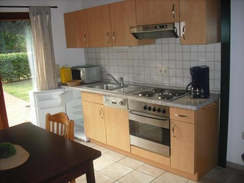 Kuchyňa alebo kuchynka v ubytovaní Apartment Rothehof