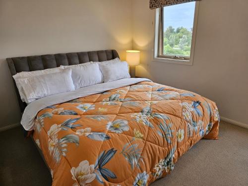 מיטה או מיטות בחדר ב-Timeless Safaris
