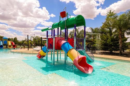 a water park with a slide in the water at Discovery Parks - Moama Waters in Moama