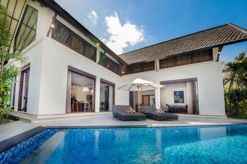 an image of a villa with a swimming pool at Villa Tramonto By Le Cielo in Canggu