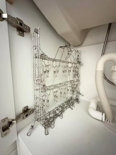 a metal shelf on a wall in a bathroom at 71 Mt view - A棟 - in Fujikawaguchiko