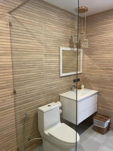 a bathroom with a toilet and a sink at The Willow Phangan in Koh Phangan
