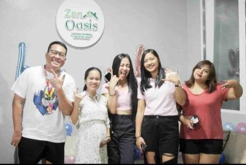 a group of people posing for a picture at Welcome to Our Farm House in Del Rosario