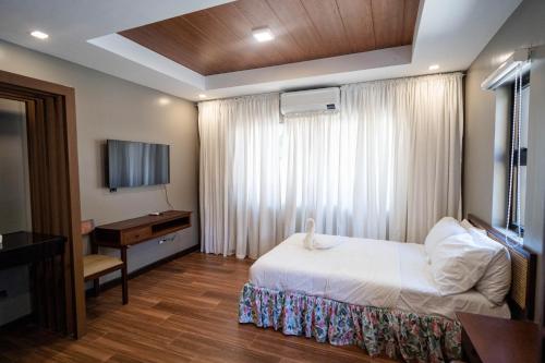 Krevet ili kreveti u jedinici u okviru objekta Villa Minerva Ecofarm & Beach Resort