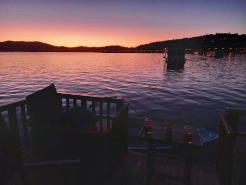 a view of a body of water at sunset at Knysna Houseboat Myrtle in Knysna