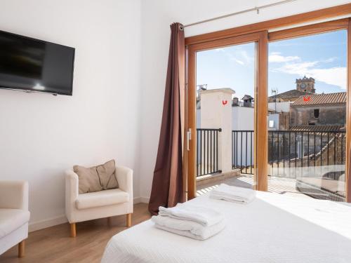 Postel nebo postele na pokoji v ubytování Townhouse San Sebastia by Sunvillas Mallorca