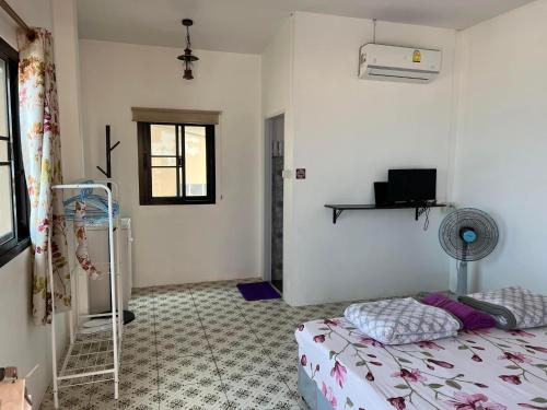 Una cama o camas en una habitación de grandmabalcony