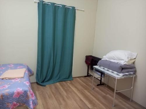 Postel nebo postele na pokoji v ubytování Bilik Bajet RM70-RM90