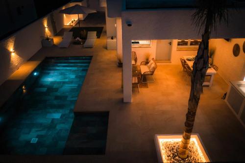 Kolam renang di atau dekat dengan Casa Gavilán En Riumar