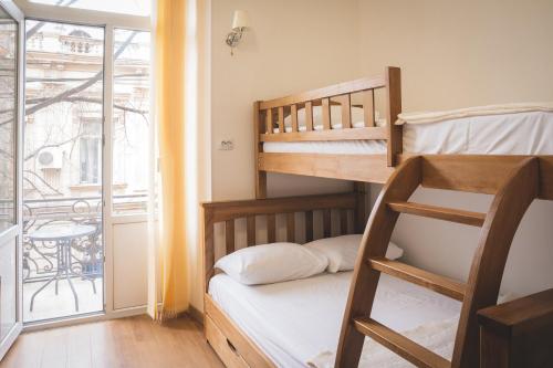 Postel nebo postele na pokoji v ubytování HH Hotel