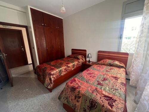Llit o llits en una habitació de Beautiful 2-Bed Apartment in Rabat Hay Riad