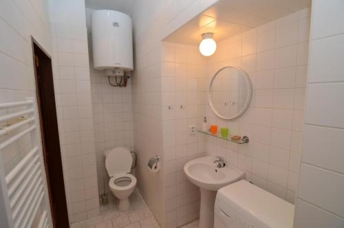 Koupelna v ubytování Apartments Karlin