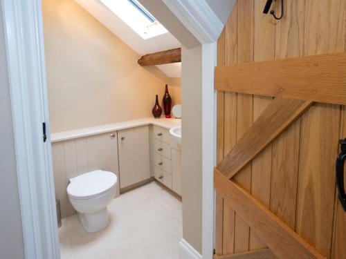 a bathroom with a toilet and a sink at 1 Bed in Ripon G0127 in Kirkby Malzeard