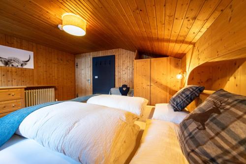 Postel nebo postele na pokoji v ubytování Panorama-Apartments Oberkofl