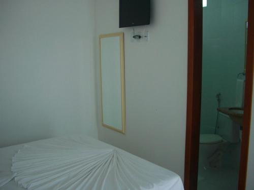 Ένα ή περισσότερα κρεβάτια σε δωμάτιο στο Hotel Ponta de Areia