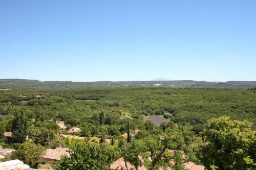 an aerial view of a small village with trees at La Closerie D'Escalin gîte 12 personnes et Jacuzzi in La Garde-Adhémar