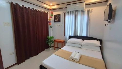 Afbeelding uit fotogalerij van RGL Place Siargao in General Luna