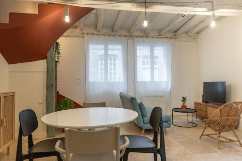 Un lugar para sentarse en Duplex avec patio - Quartier historique