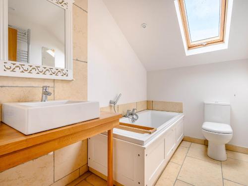 a bathroom with a sink and a toilet at 2 Bed in Cunsey 88319 in Far Sawrey