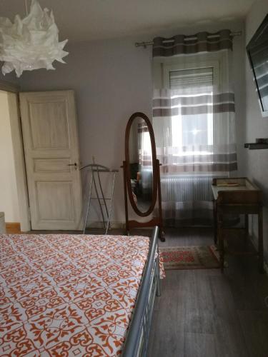 Postel nebo postele na pokoji v ubytování "Côté nature", appartement cosy au cœur de Munster