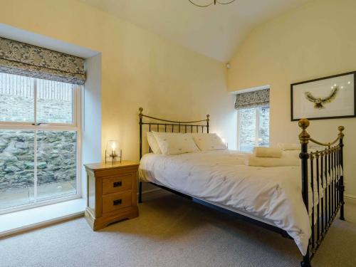 a bedroom with a large bed and a window at 4 Bed in Durham 89858 in Willington