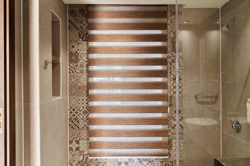 a staircase in a bathroom with a shower at True Beach Resort in Marsa Alam City
