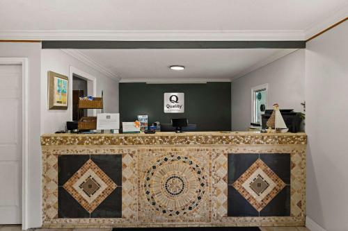 a bar in a room with a counter at Quality Inn in Ocean Springs