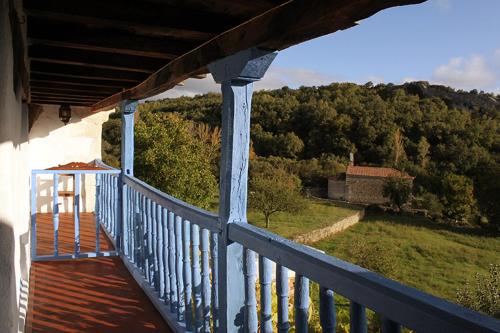 a balcony of a house with a view of a field at Casa BlaBlao 